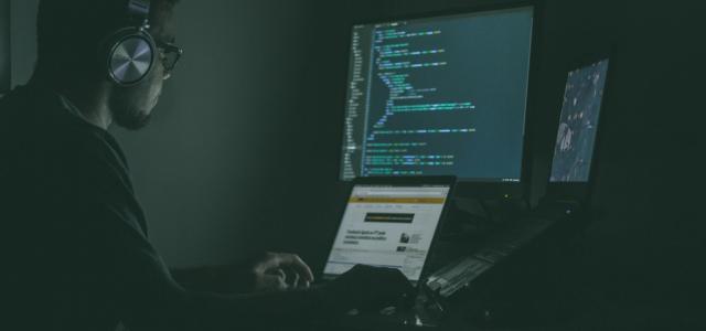 person using laptop computers by Jefferson Santos courtesy of Unsplash.